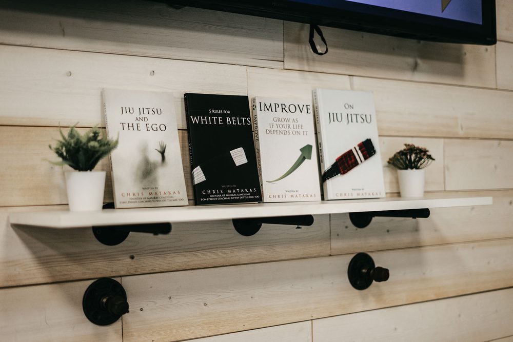 Chris Matakas books on a shelf